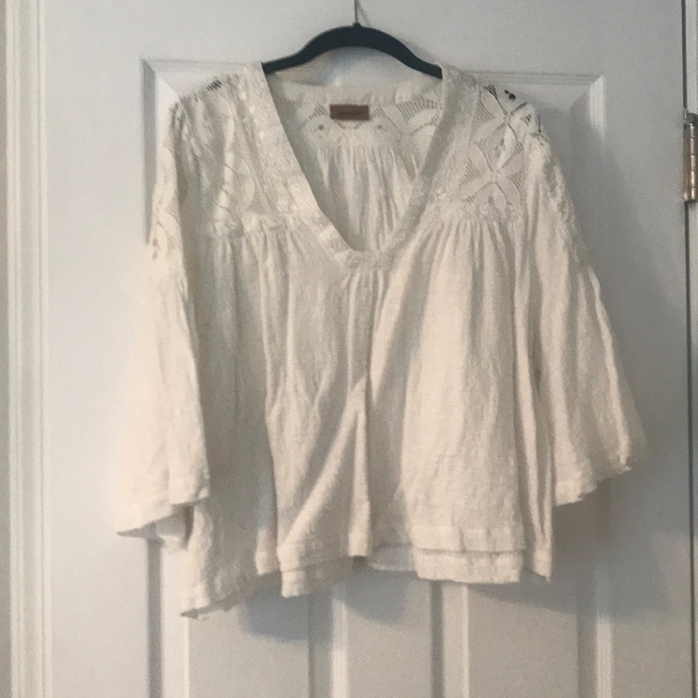 White Wrangler brand flows top